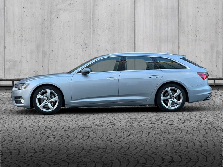 Sølvmetal Audi A6 TFSi Avant quattro S-tr. fra 2021 parkeret foran en betonmur. CORE Leasing A/S er eksperter i Audi leasing.