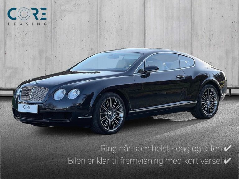 Blåmetal Bentley Continental GT aut. fra 2007 parkeret foran en betonmur. CORE Leasing A/S er eksperter i Bentley leasing.